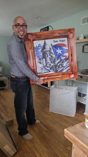 Man holding domino table with Puerto Rico Design